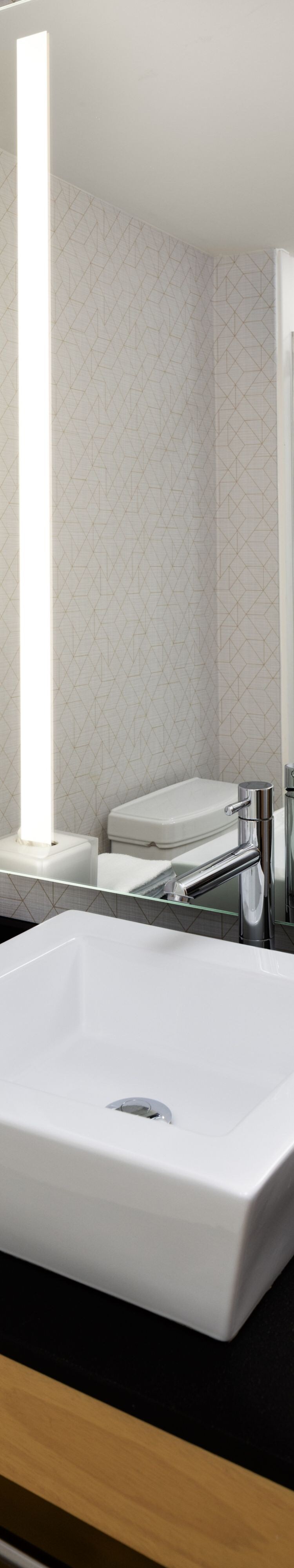 Bathroom with vessel sink and mirror