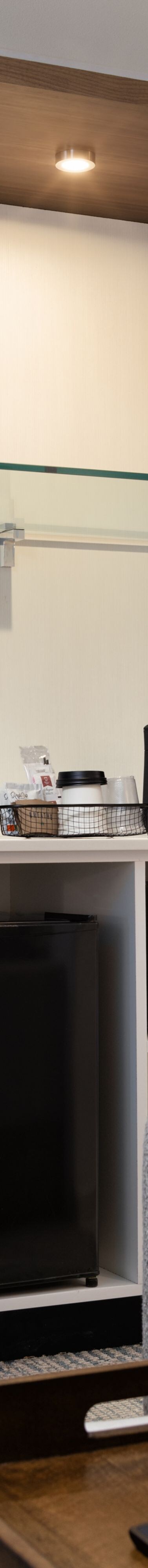 Guest room with coffee station and fridge