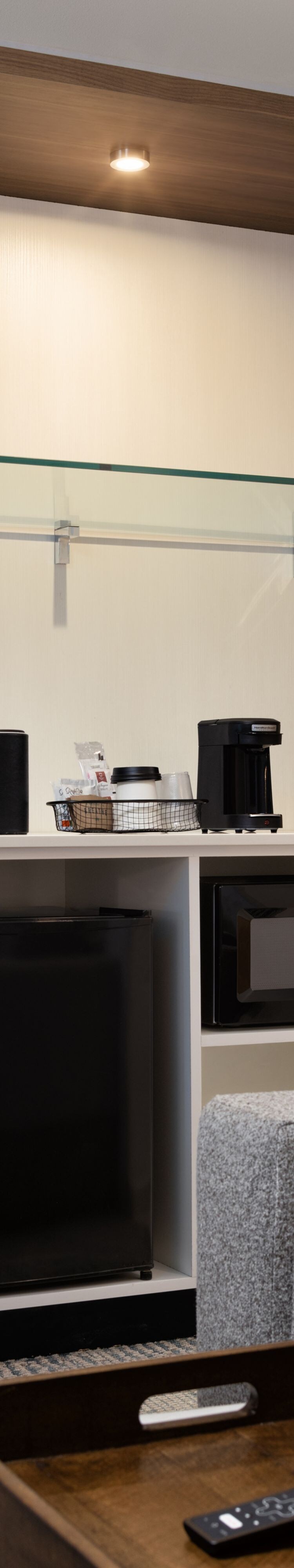 Guest room with coffee station and fridge