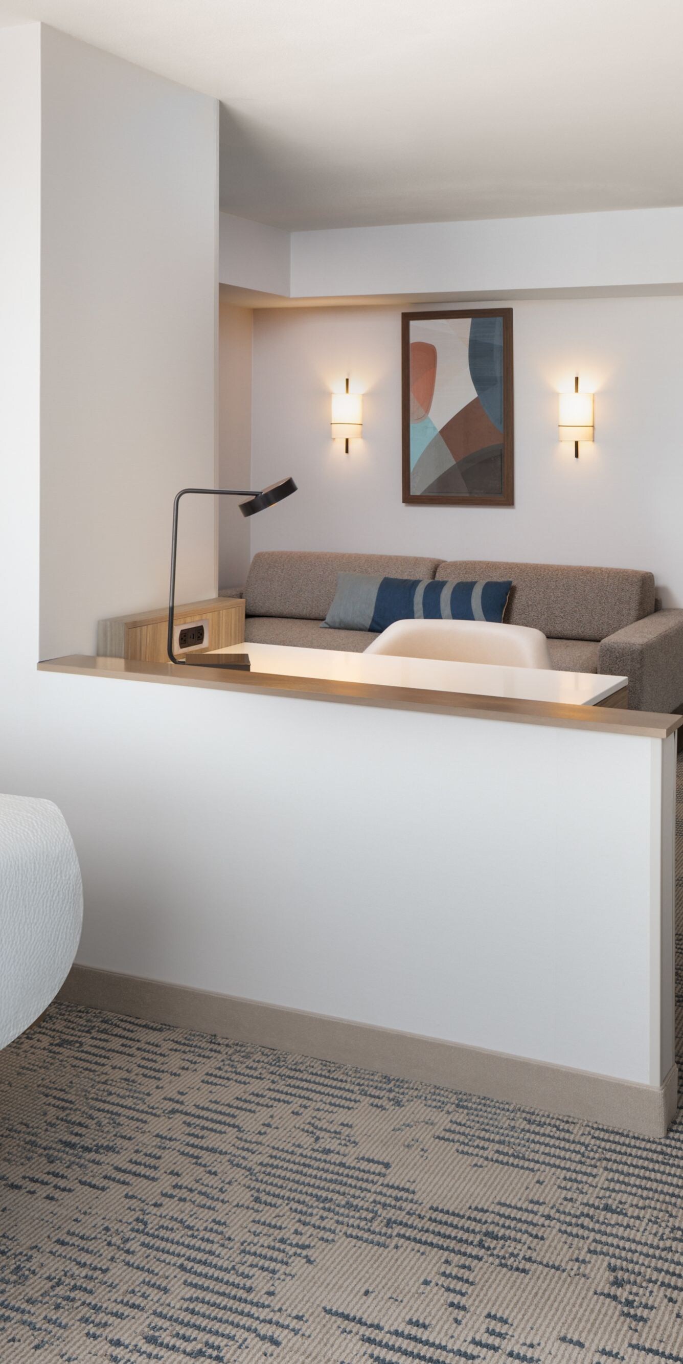 Guest room with king bed and workspace