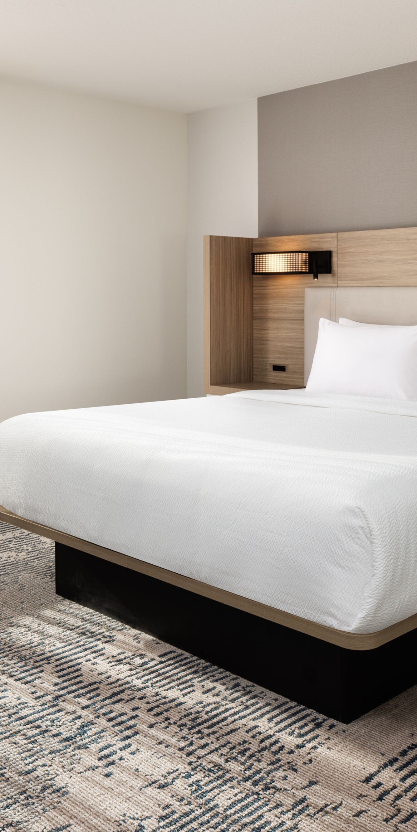 King guest room with modern headboard