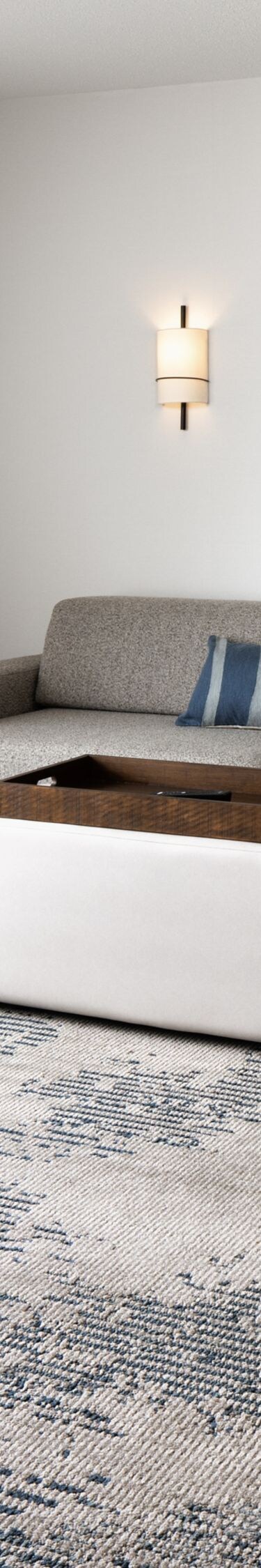 Suite living area with sofa and coffee bar