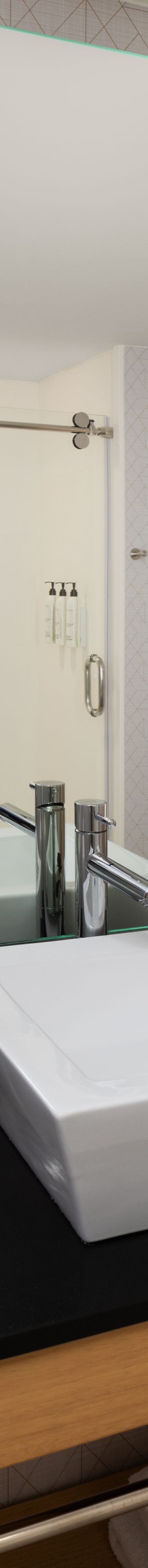 Modern bathroom with vessel sink and mirror