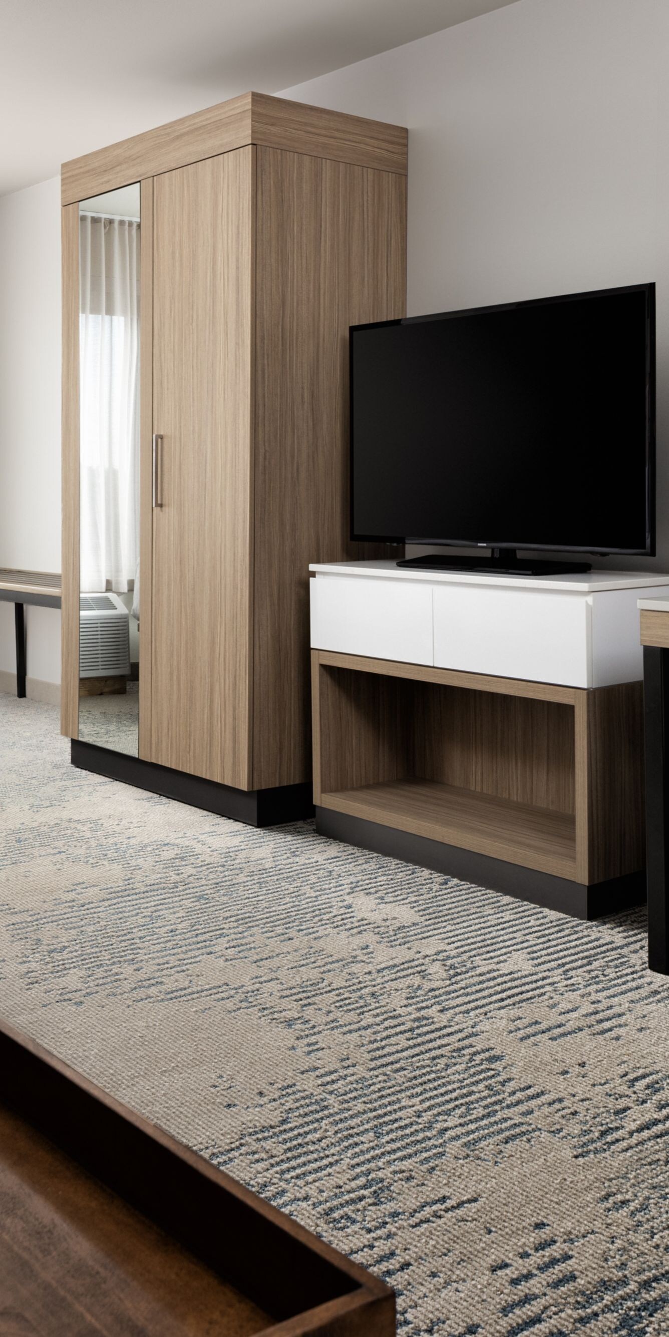 Guest room with work desk and modern decor