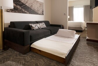 All rooms include the comfortable West Elm Sofa Tr