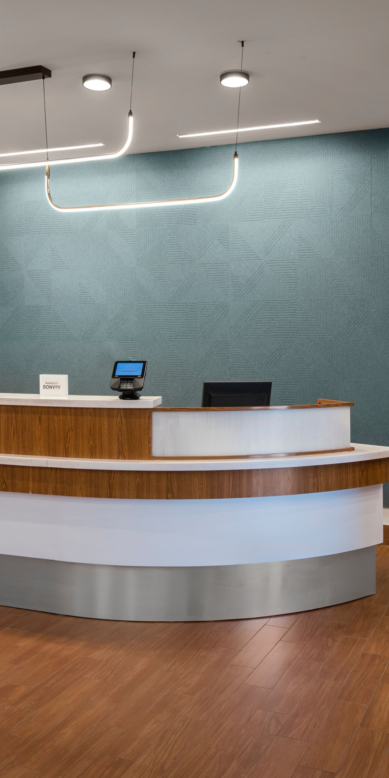 Front desk reception area with check-in counter