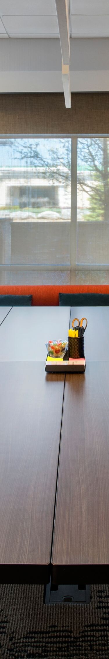 Meeting room with conference boardroom-style setup