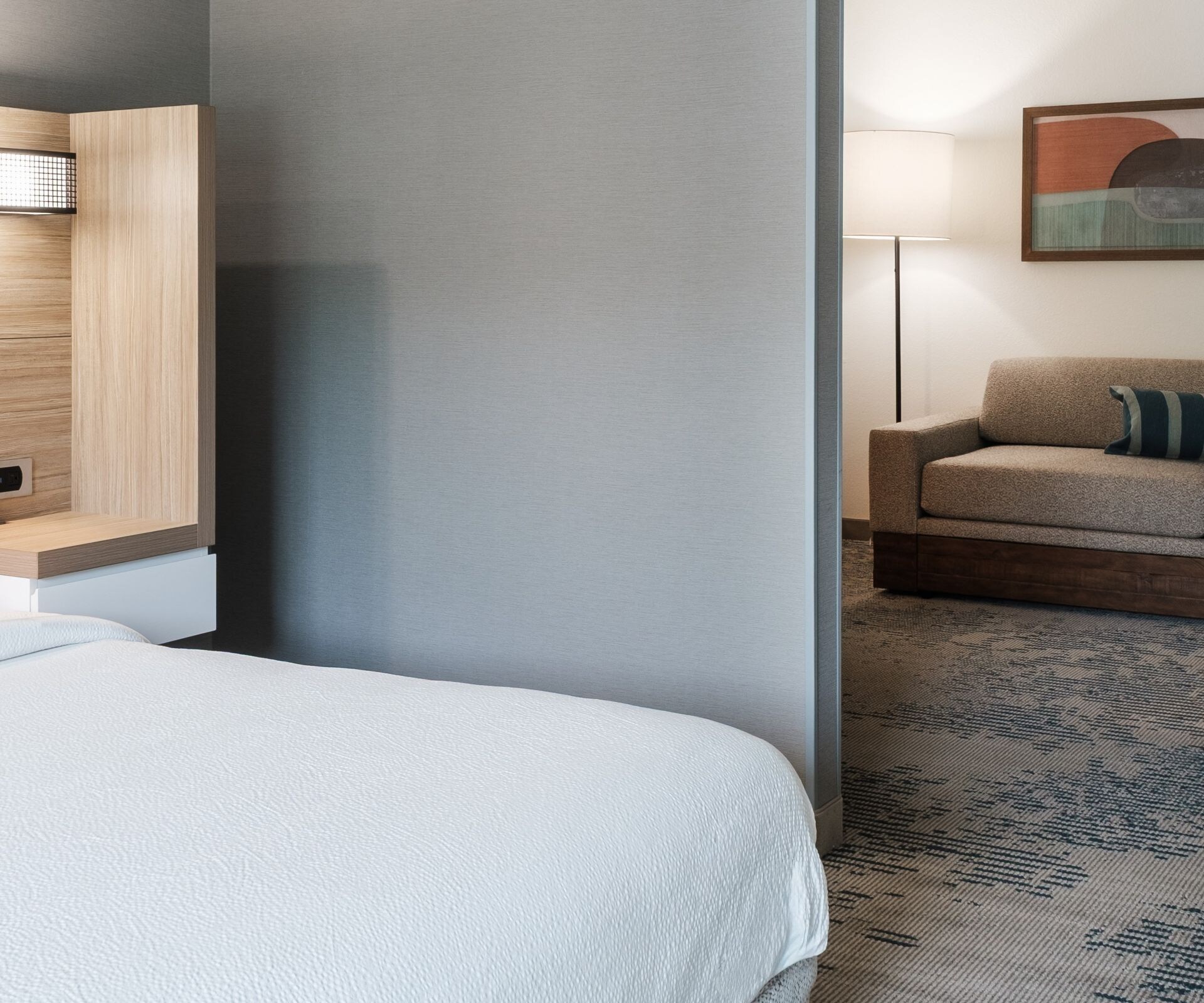 King Suite with view of bed and sitting area