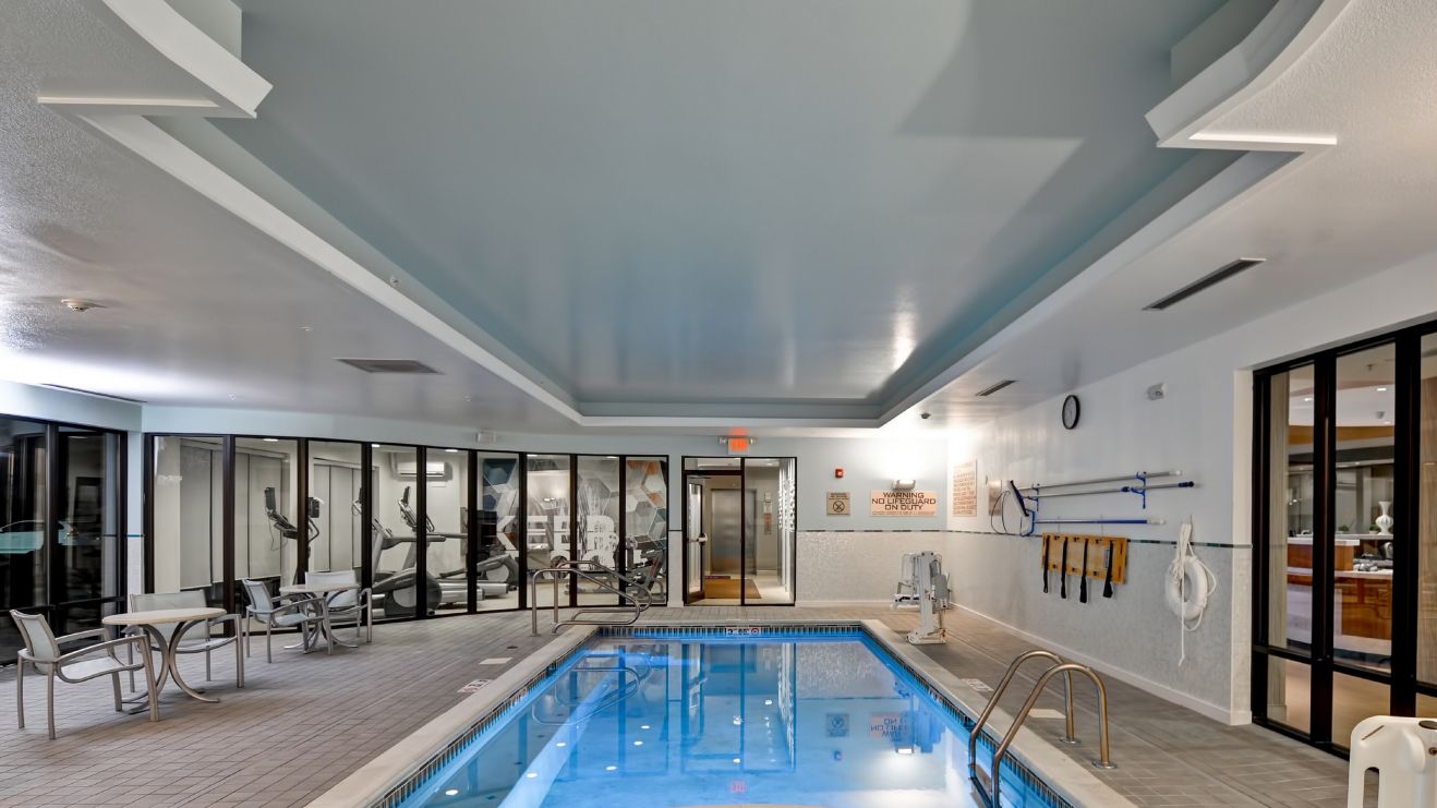 Pool and gym equipment in room