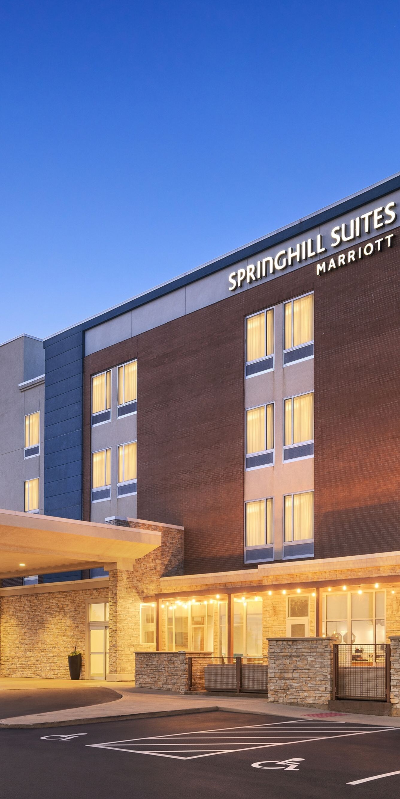 Hotel exterior entrance at dusk 
