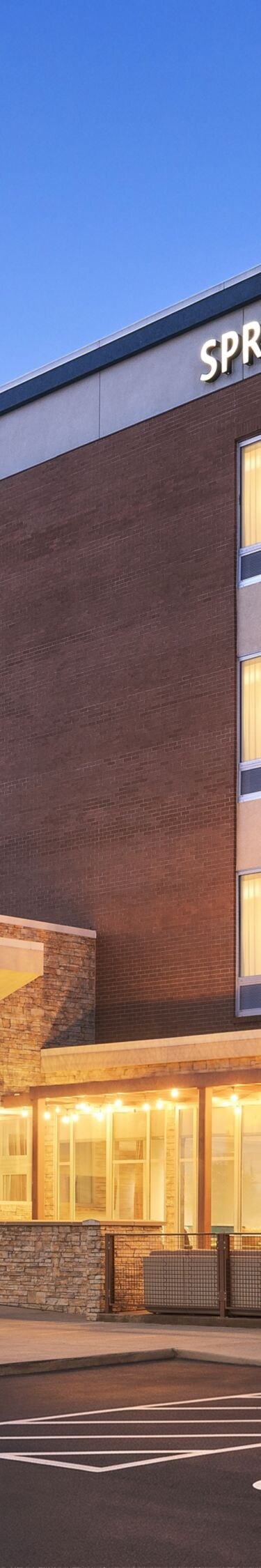 Hotel exterior entrance at dusk 
