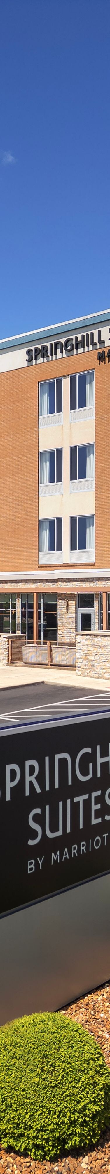 Front Entrance and parking lot of hotel