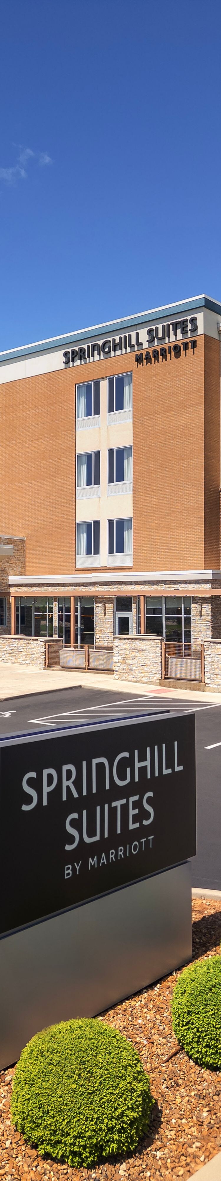 Front Entrance and parking lot of hotel