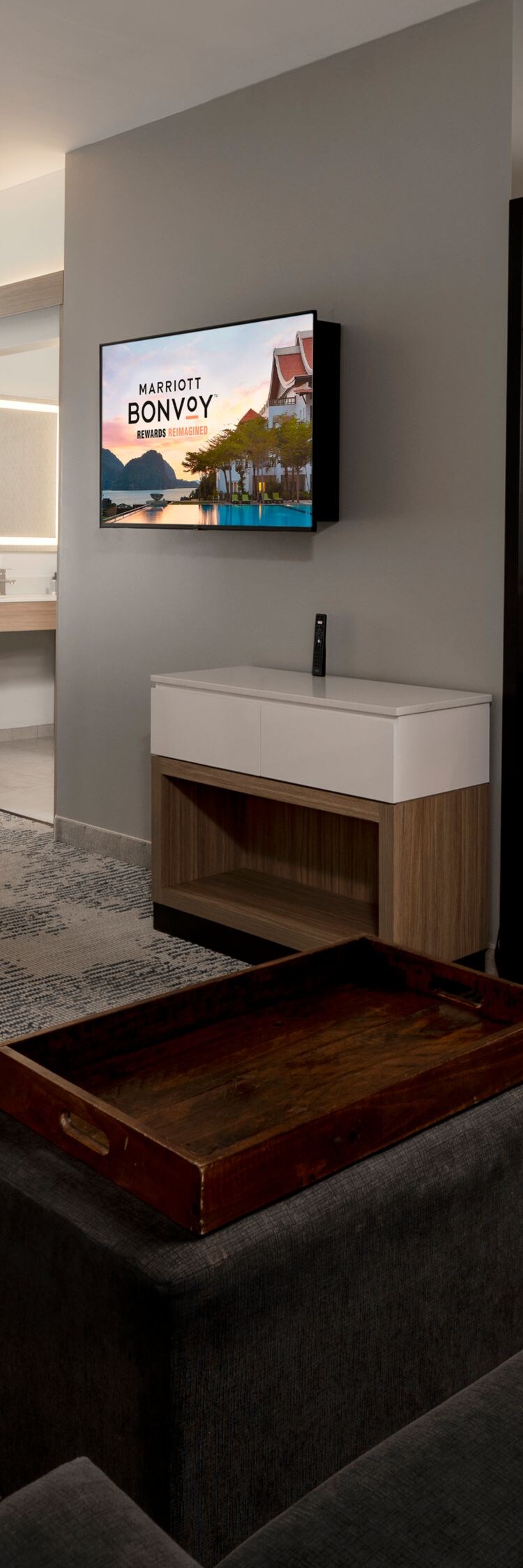 King Suite with a work desk, sofa and tv