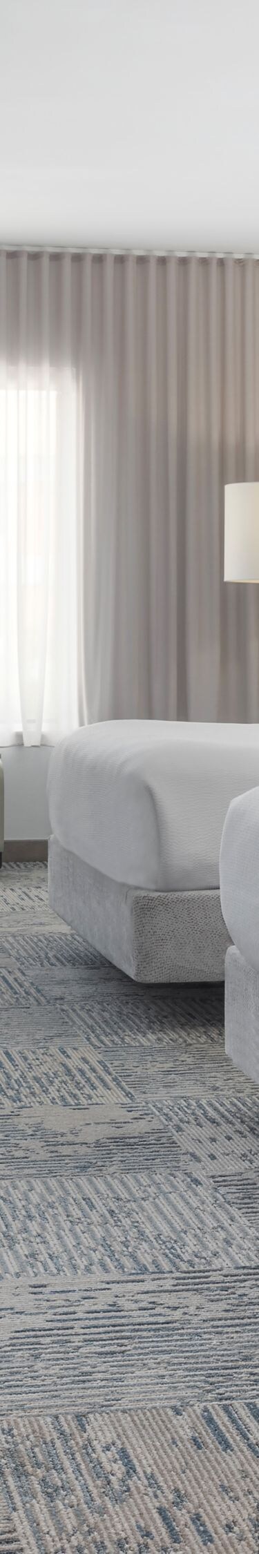 Accessible suite with two beds and kitchenette