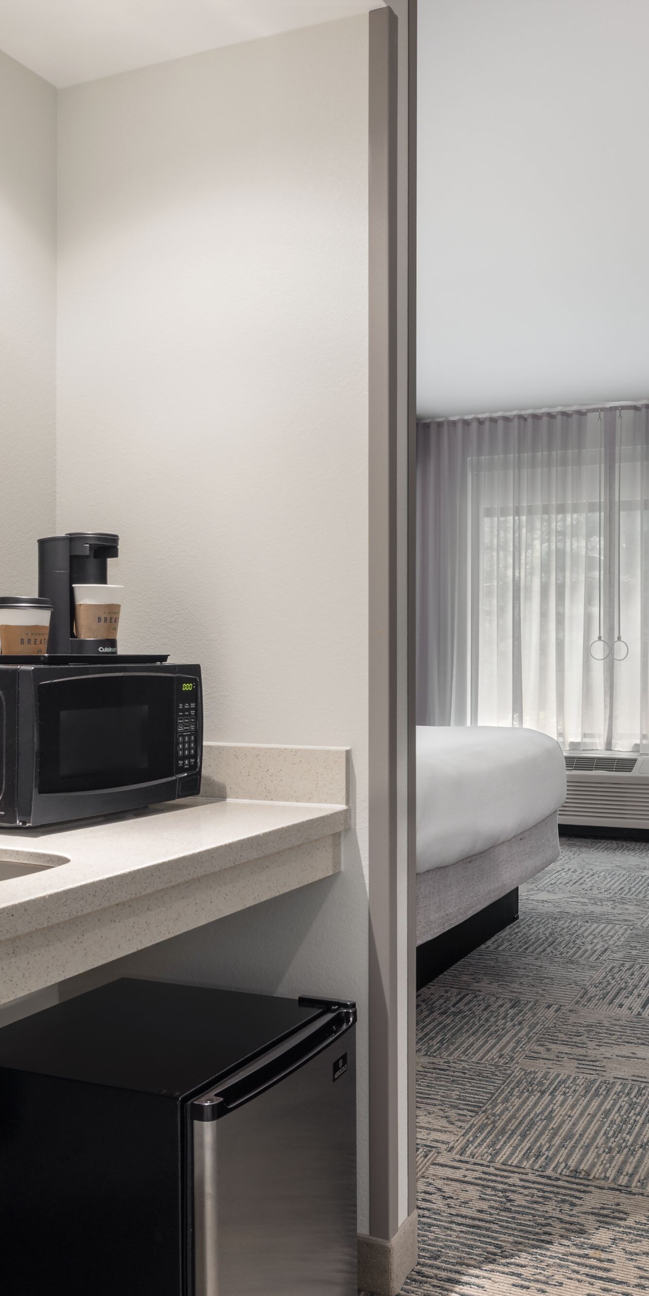Accessible suite with kitchenette and work desk