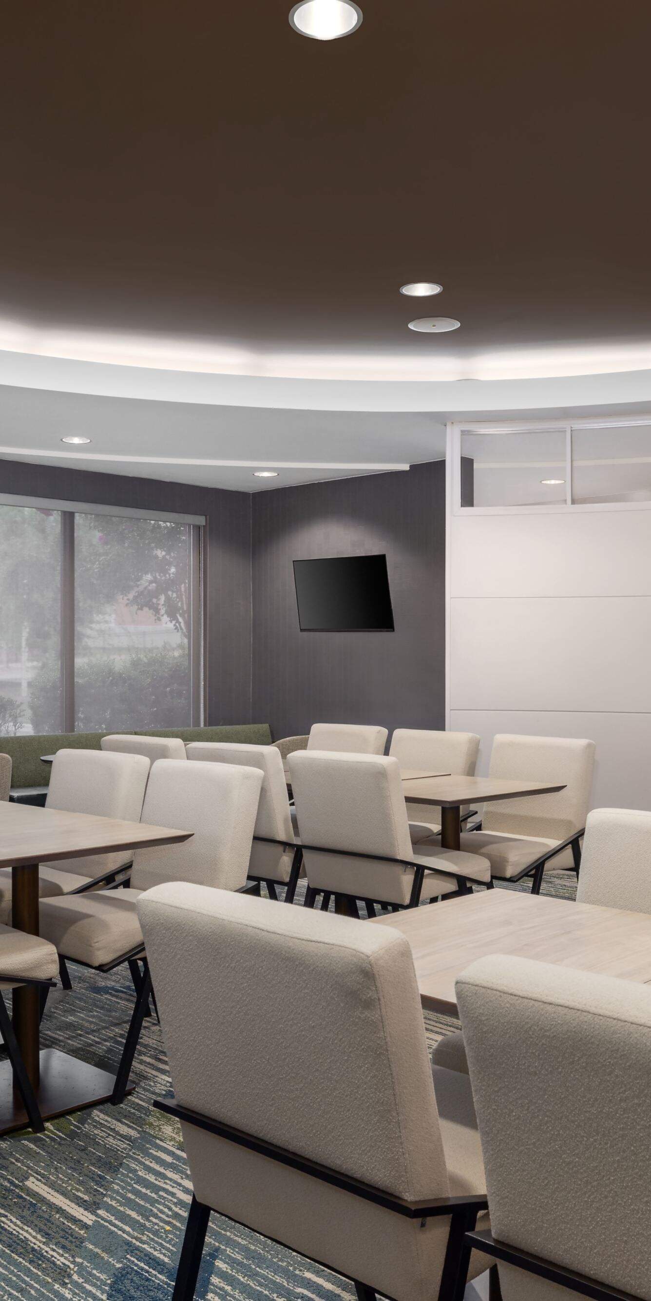 Dining area with tables, chairs and coffee station