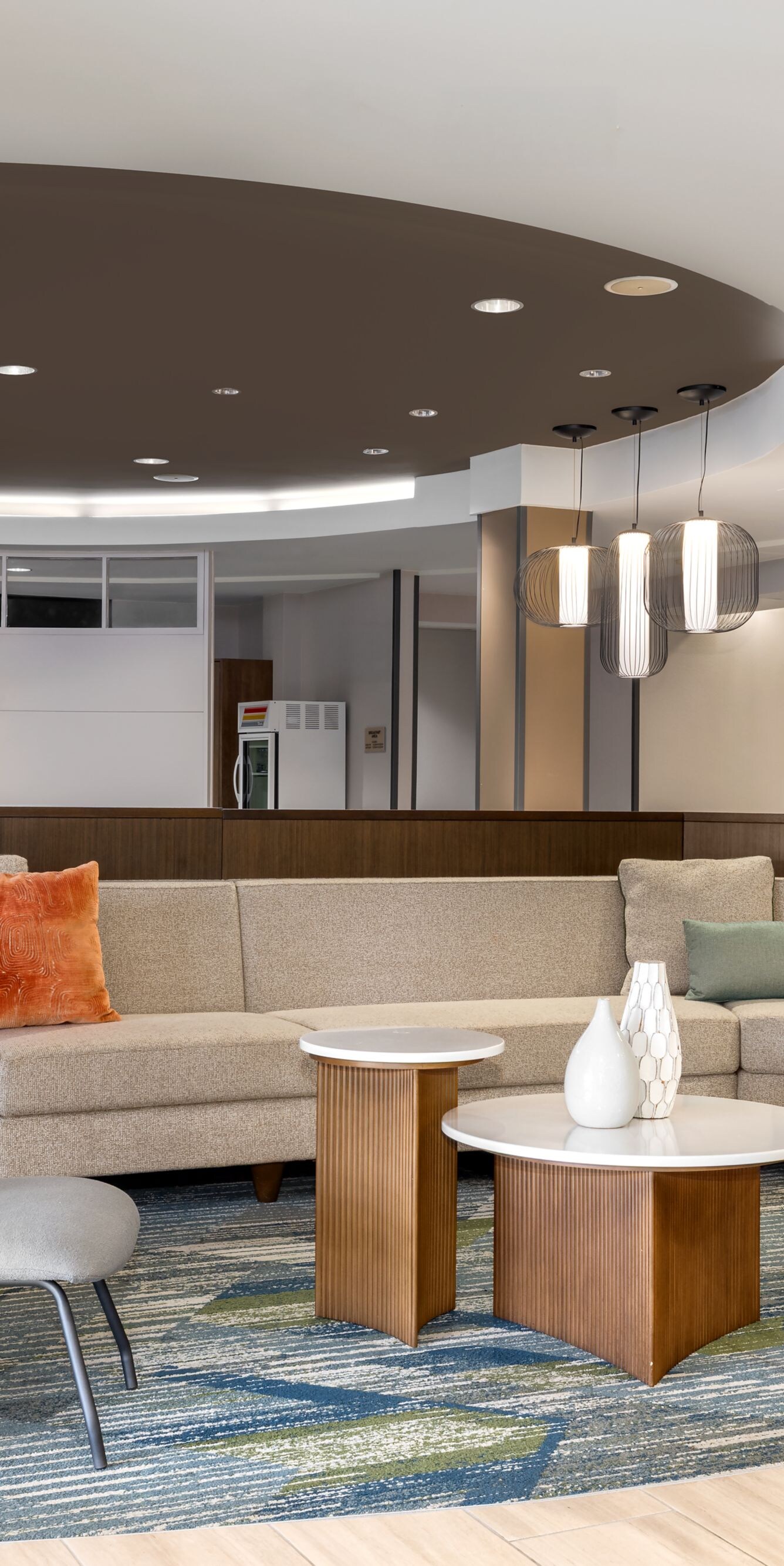 Lobby seating area with chairs and tables