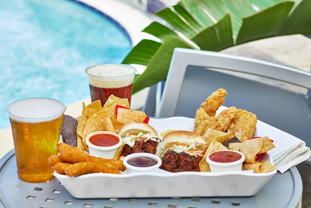 basket of fried food, dipping sauces & beer