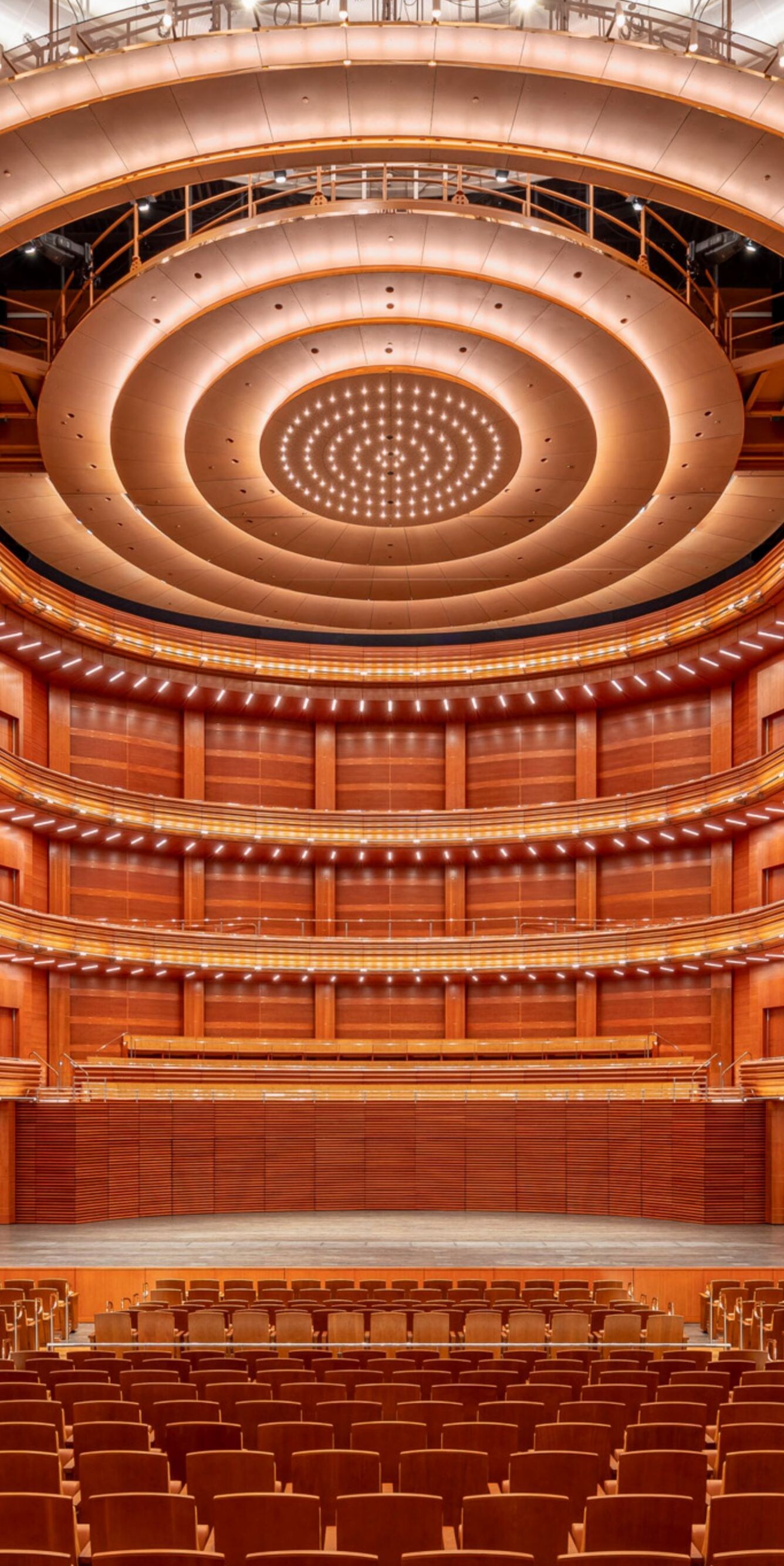 Theater with empty seats and stage.