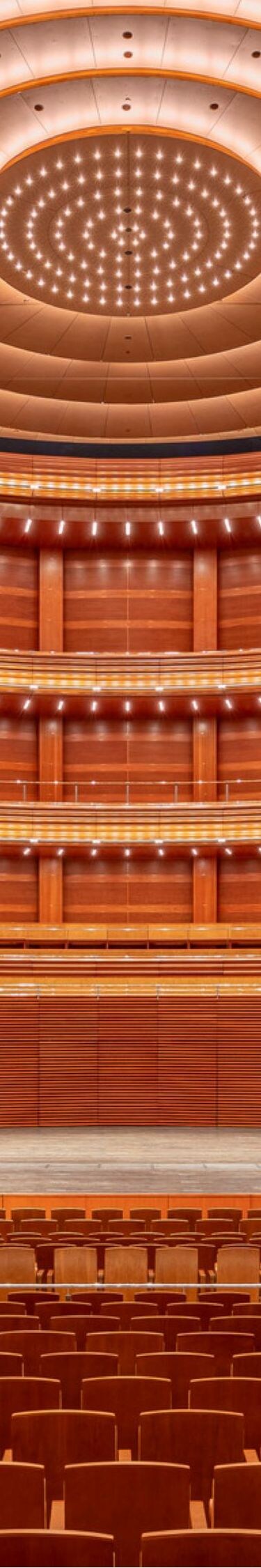 Theater with empty seats and stage.