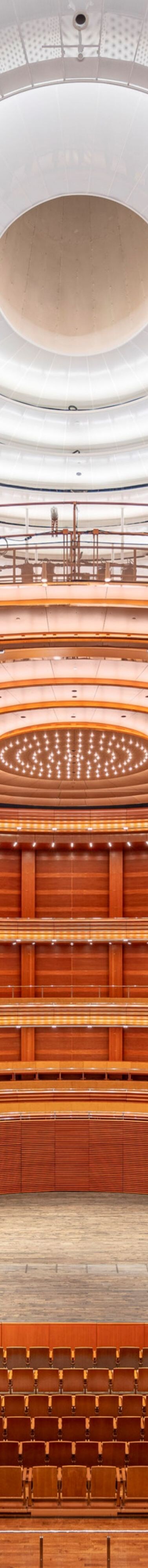 Theater with empty seats and stage.