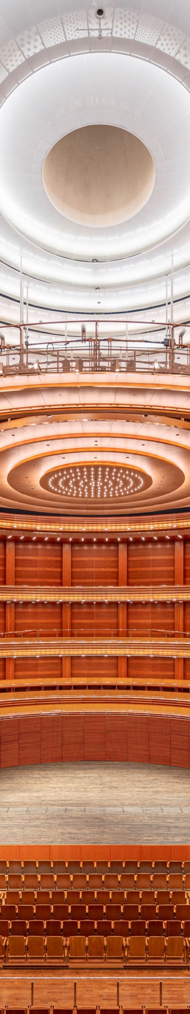 Theater with empty seats and stage.
