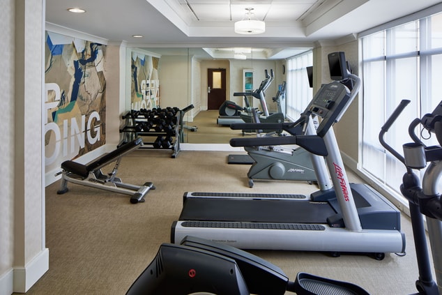 Fitness Center with treadmills and ellipticals.