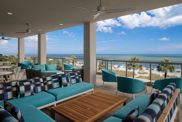 Outdoor terrace seating with ocean view