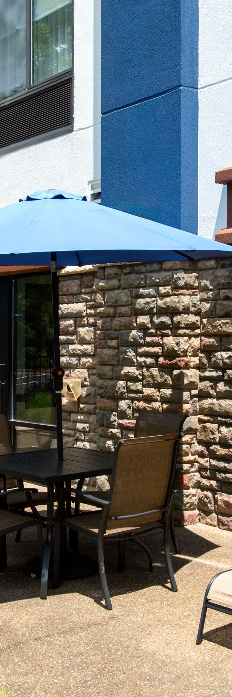 Patio with umbrellas and seating