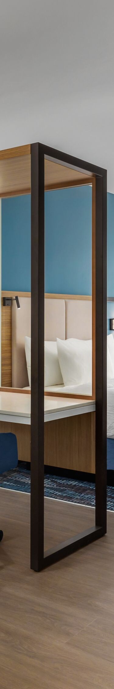 two beds, desk, sitting area, mini-bar