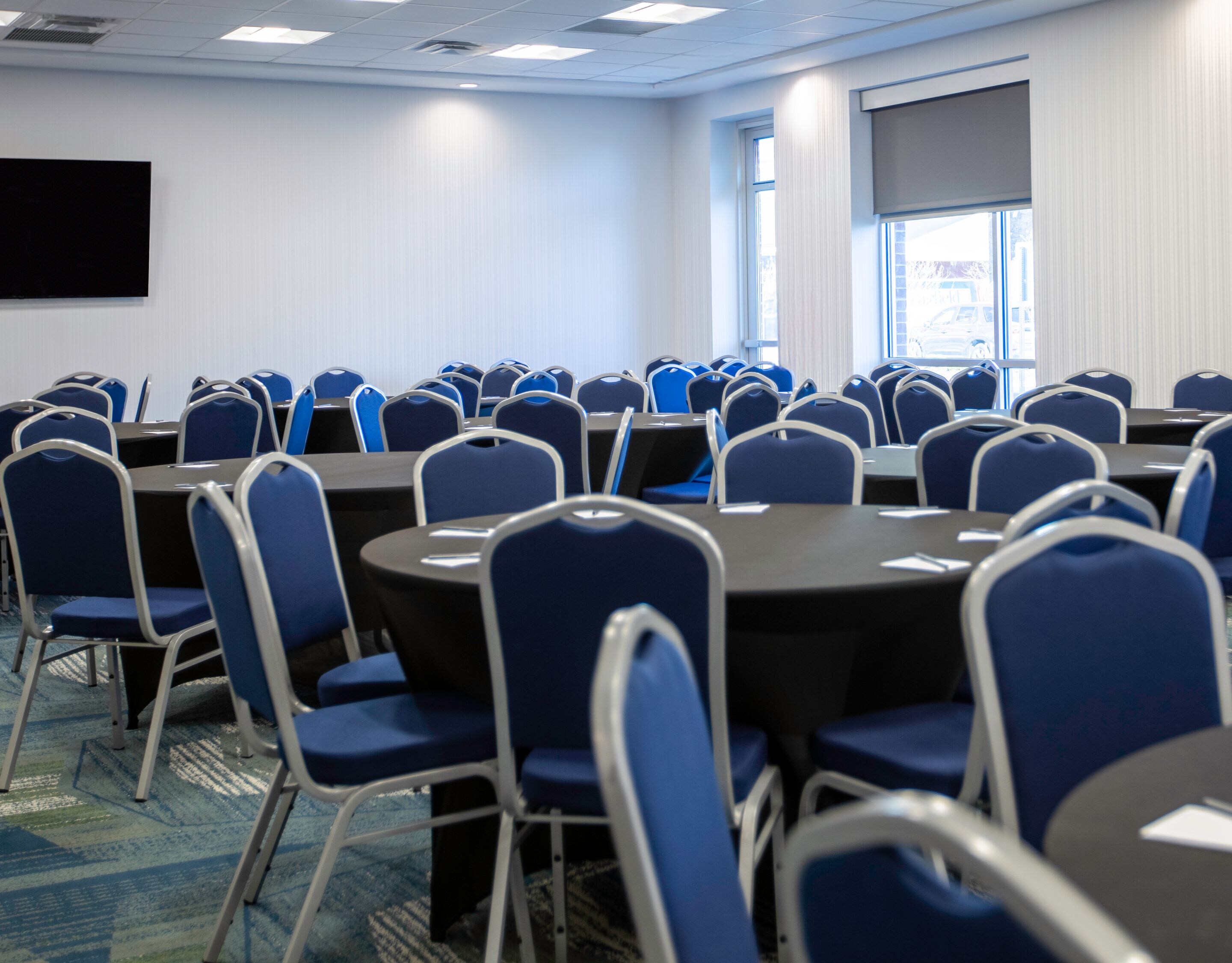 Meeting room with blue chairs