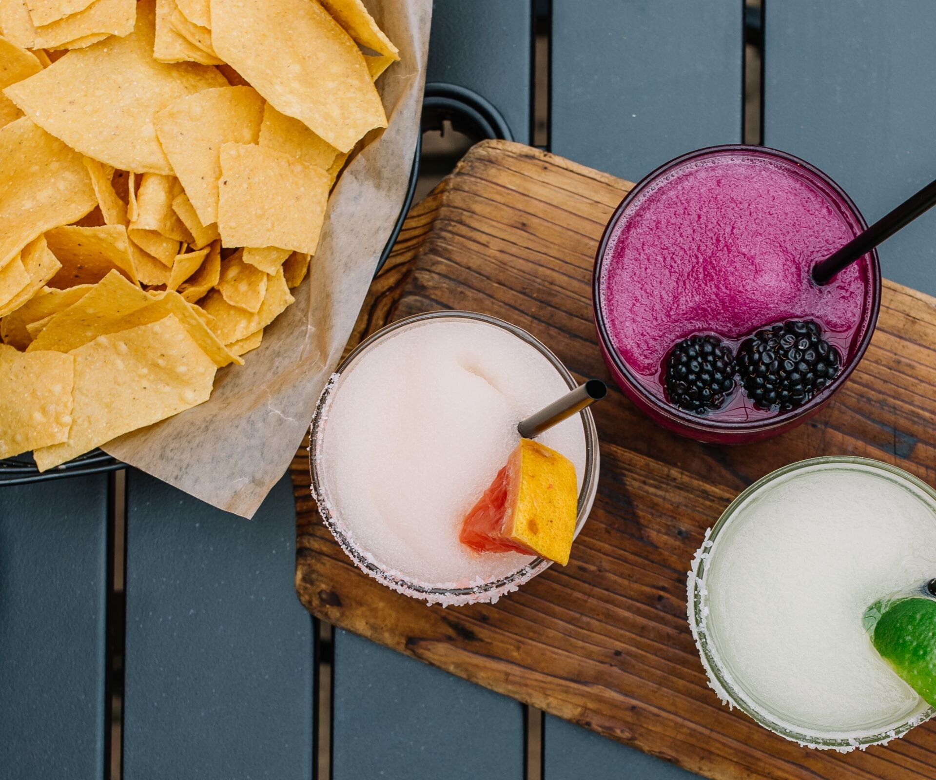  four cocktails with chips and salsa