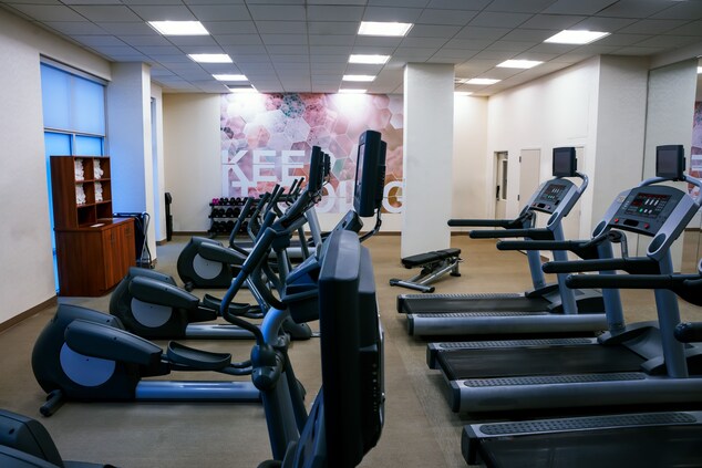 Fitness Center with cardio machines and weights