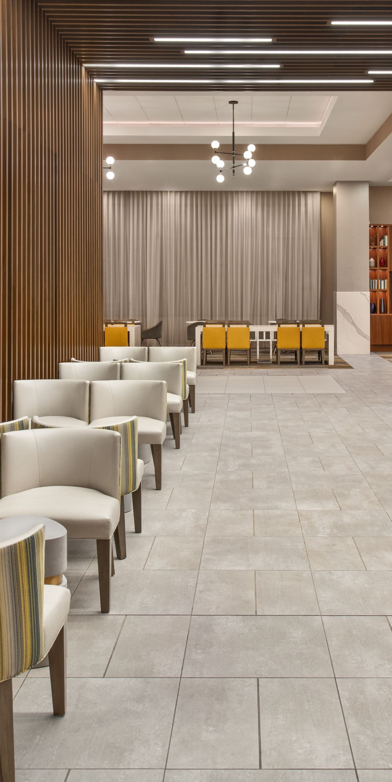Dining chairs and stools near the bar