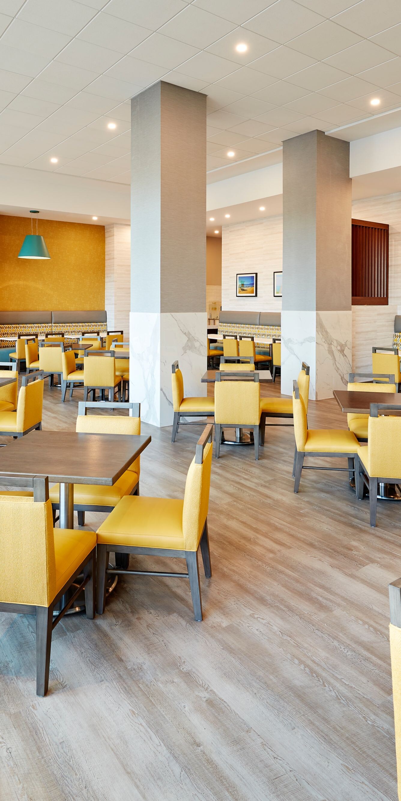 Breakfast seating area with dining tables