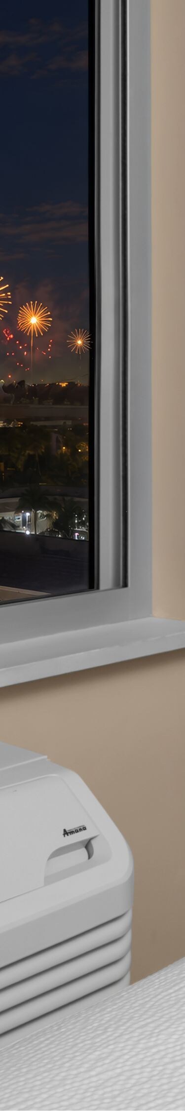 Nighttime fireworks seen from guest room window