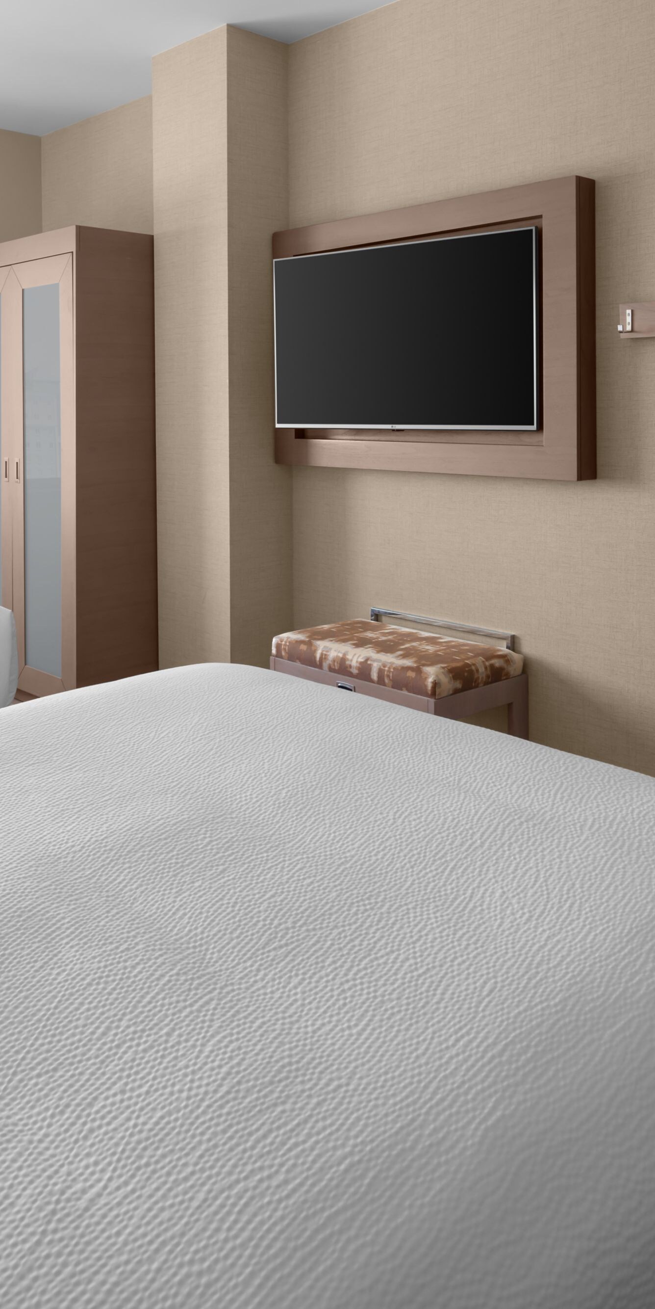 Two queen beds and window with resort view
