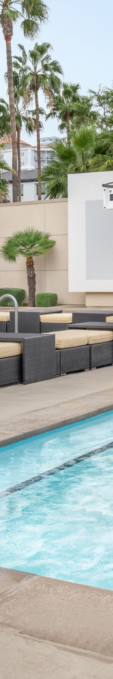 Outdoor hot tub beside the pool