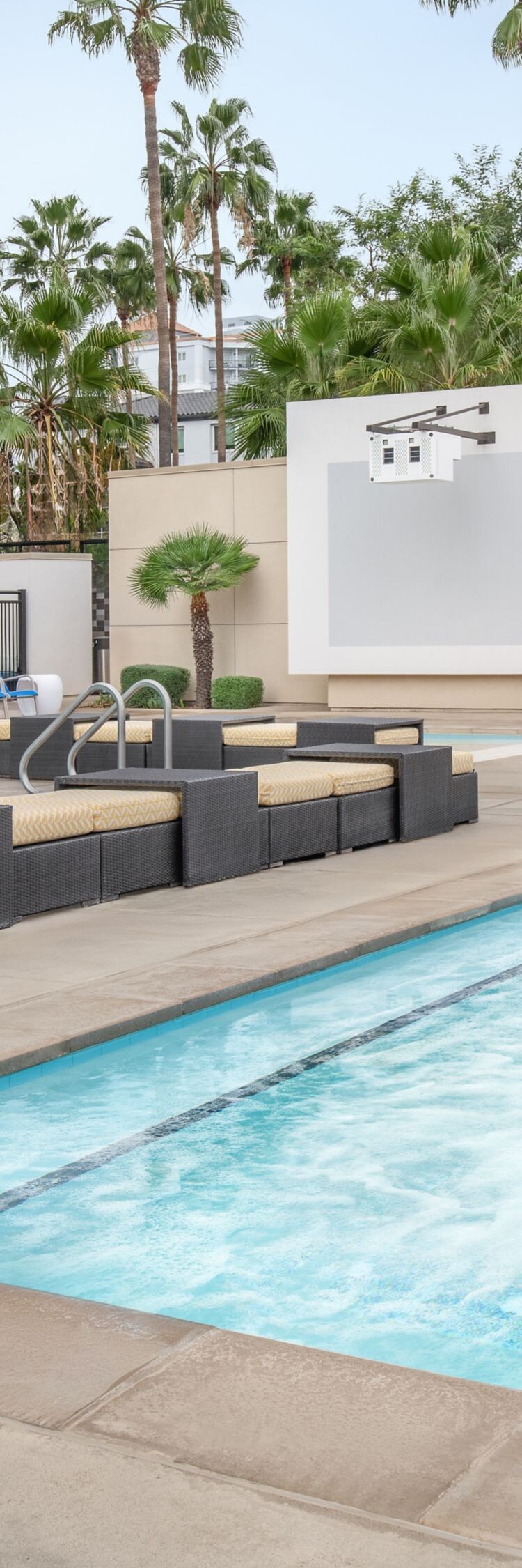 Outdoor hot tub beside the pool