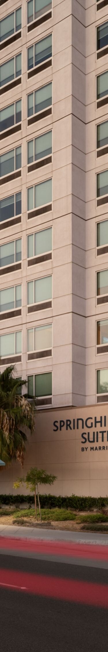 Illuminated hotel exterior at dusk