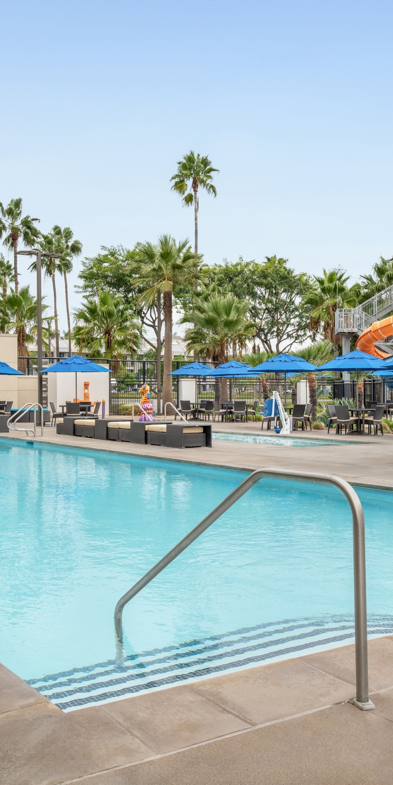 Outdoor pool with loungers