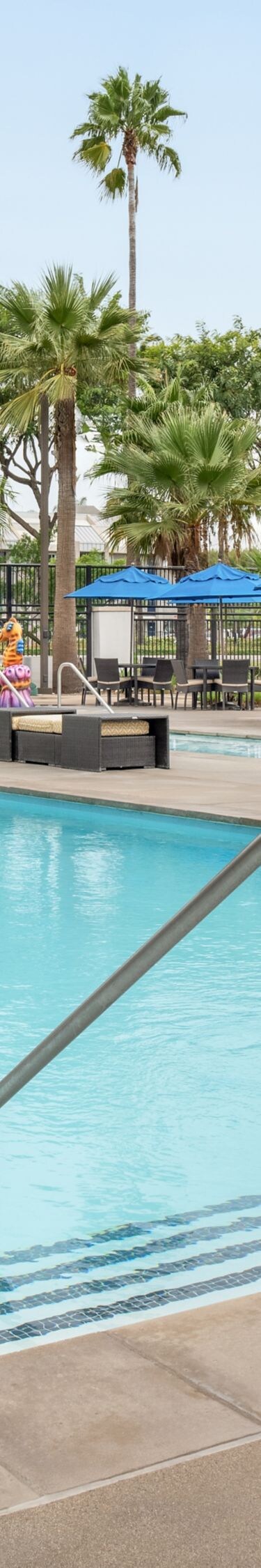 Outdoor pool with loungers