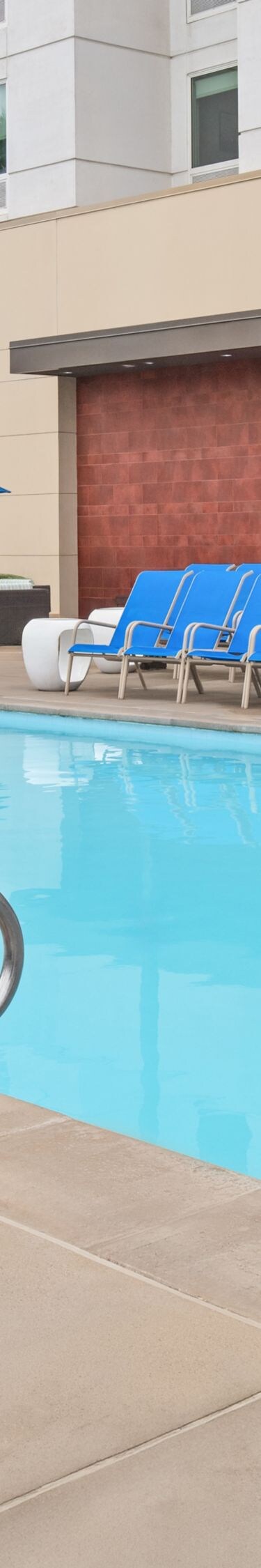 Main pool surrounded by lounge seating