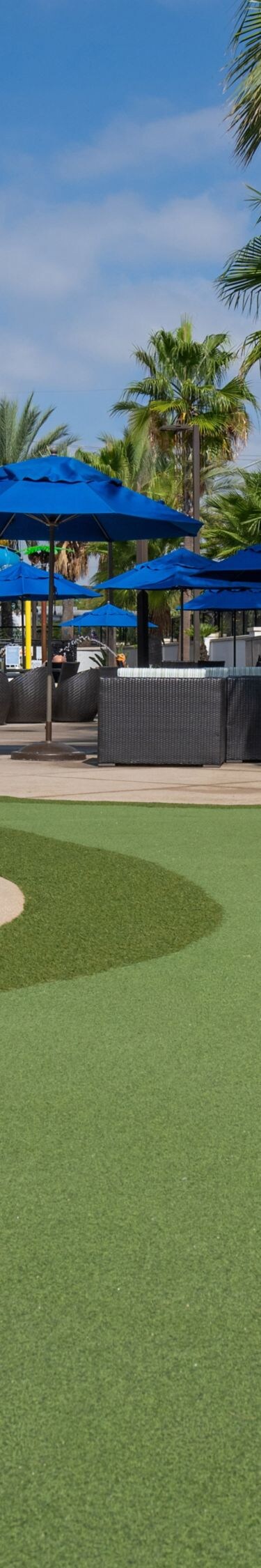 Outdoor mini golf green and seating