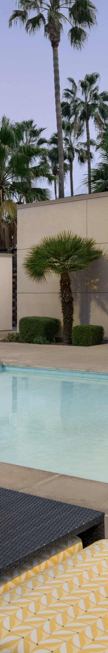 Outdoor Pool with lounge chairs and movie screen