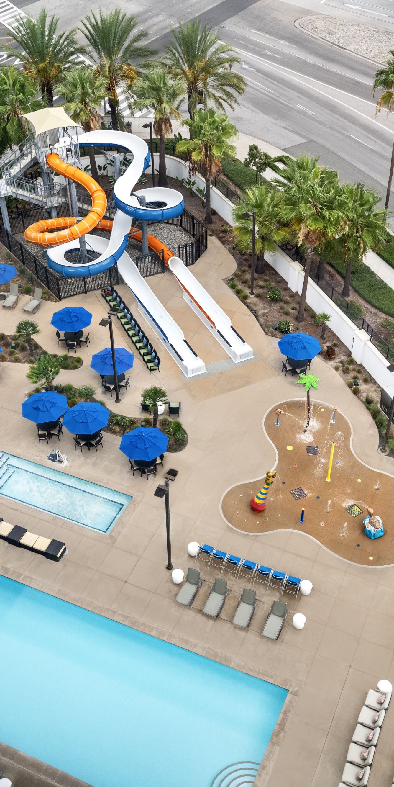 Overhead view of pools, pool seating, and slide
