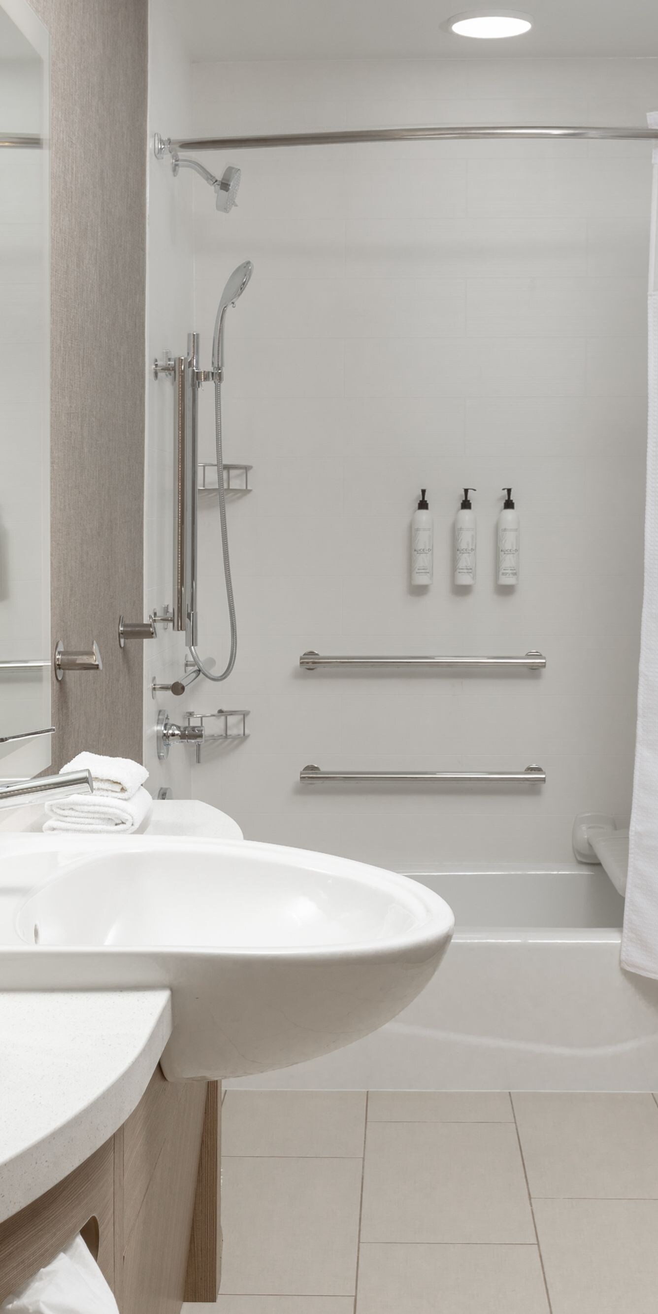 ADA accessible bathtub with grab bars