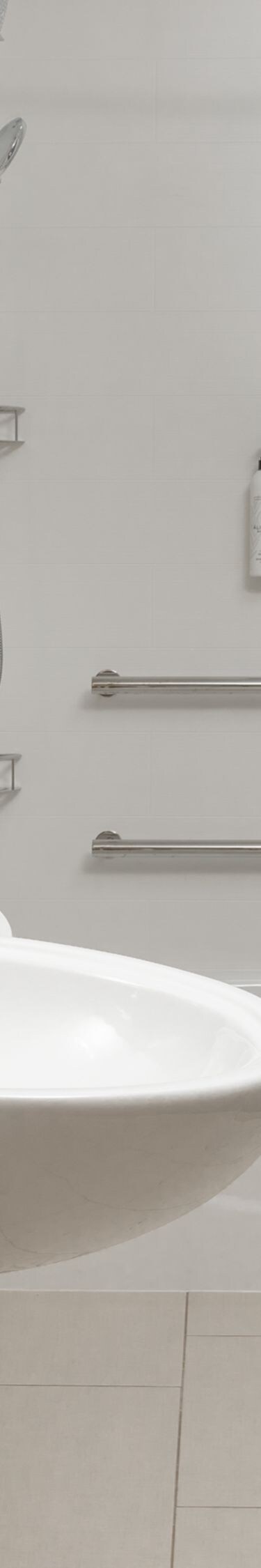 ADA accessible bathtub with grab bars