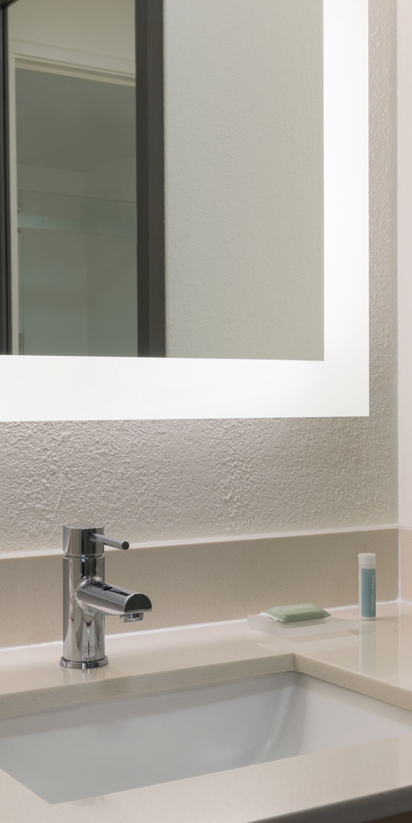 Bathroom vanity with soft lighting